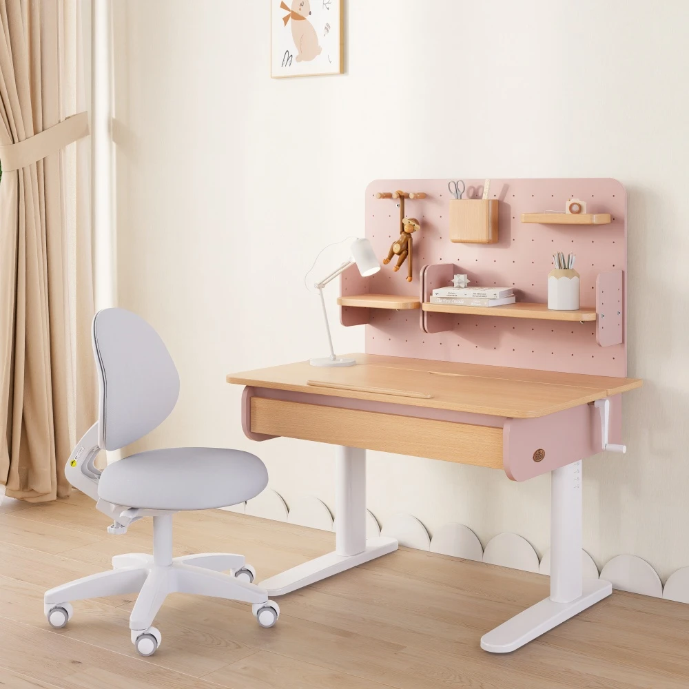Height-adjustable wooden kids desk in dusty pink with a matching grey ergonomic study chair, set up in a children's bedroom with a pegboard organizer Height-adjustable wooden kids desk in dusty pink with a matching grey ergonomic study chair, set up in a children's bedroom with a pegboard organizer