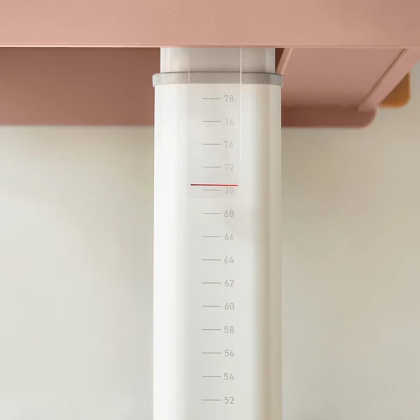 Close-up of a height-adjustable desk leg with height markings ranging from 52 to 78 centimeters Close-up of a height-adjustable desk leg with height markings ranging from 52 to 78 centimeters